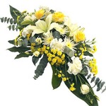 Yellow and white double ended spray by Funeral Flowers London
